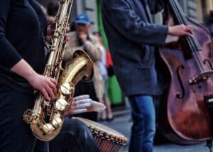 street-musicians-playing-saxophone-bass-and-drum-